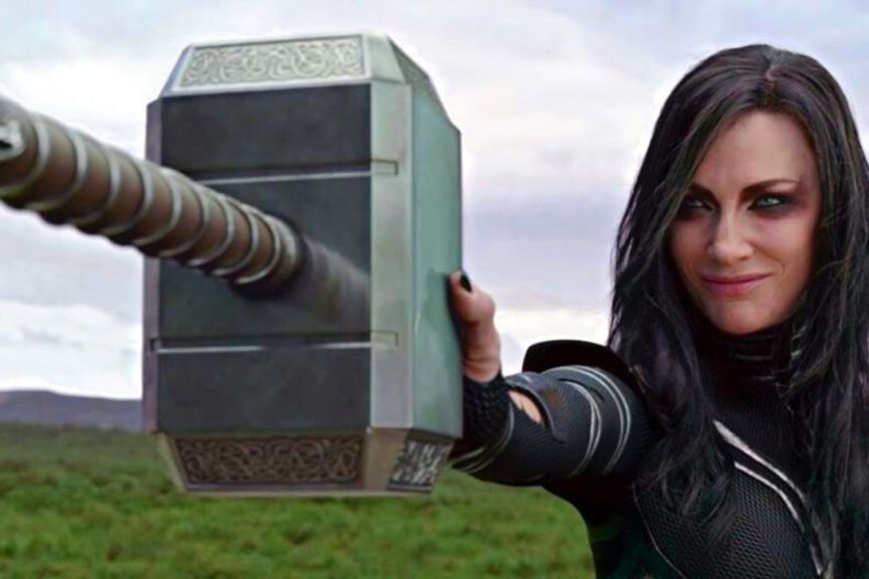 Hela stopping Thor's hammer.