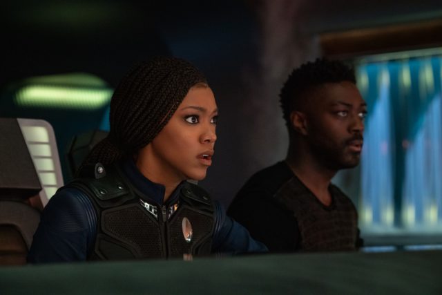 Sonequa Martin-Green as Commander Burnham and David Ajala as Book