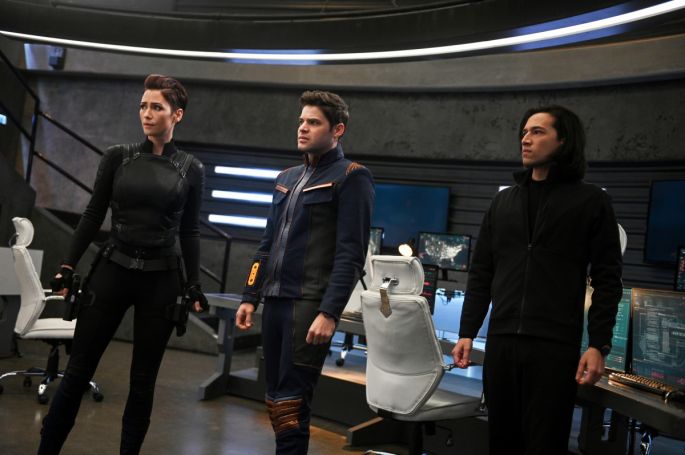 Chyler Leigh as Alex Danvers and Jeremy Jordan as Winn Schott and esse Rath as Brainiac-5